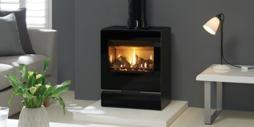 A gas stove on a white hearth